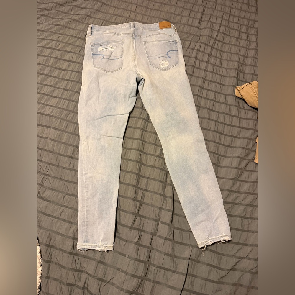 American Eagle Outfitters Light Blue Skinny Jeans with Distressed Back Pockets